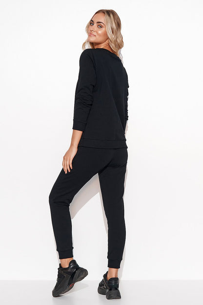 Elegant Women's Makadamia Sweatshirt Set with Crystal Detail and Comfortable Long Pants, fashionable black outfit highlighting the back view of the sweatshirt and pants.