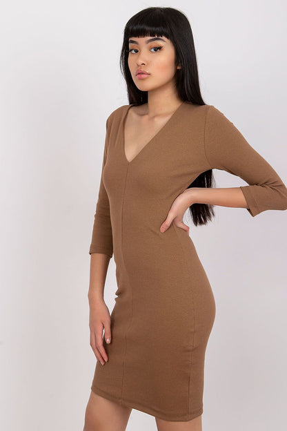 Elegant Ribbed Pencil Dress by Rue Paris captured side-view, emphasising the long sleeves and flattering heart neckline, ideal for smart casual occasions.