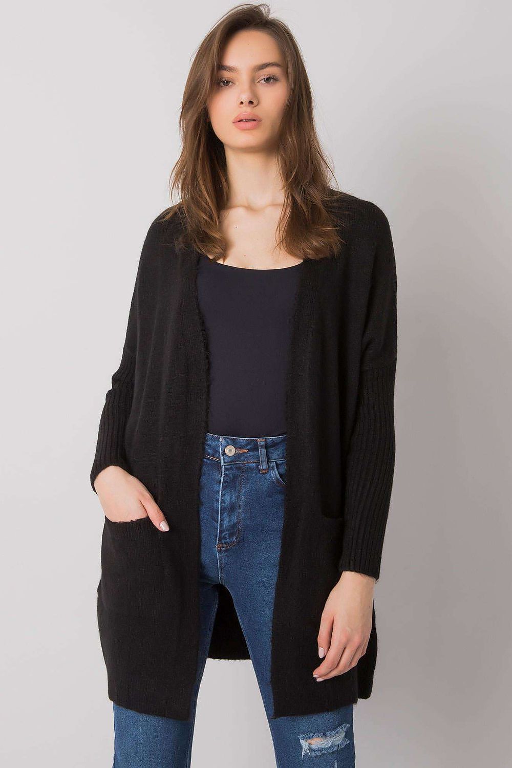 Elegant black long-sleeve cardigan from Rue Paris featuring slip pockets, embodying sophistication and comfort with a luxurious 75% acrylic composition.
