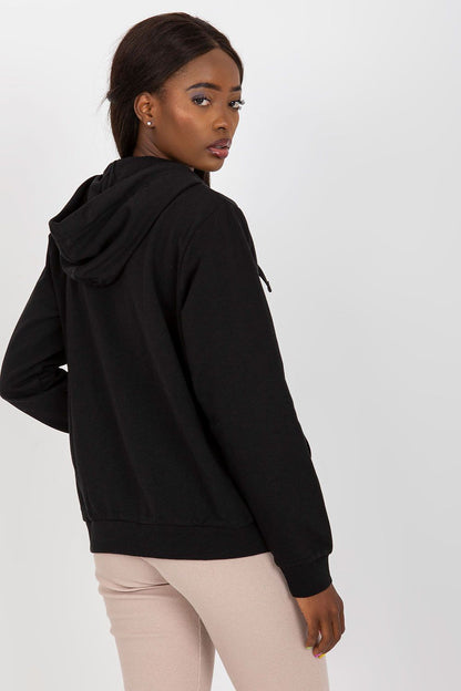 Women’s Luxury Hooded Zippered Sweatshirt with Front Pockets - BFG, Cotton-Blend Fabric. Rear view of a stylish model donned in a sleek black sweatshirt, showcasing the elegant hood.