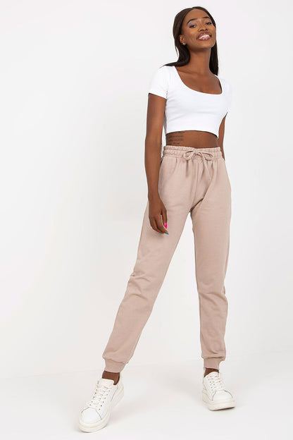 BFG High-Waisted Sweatpants with Elastic Waistband and Side Pockets elegantly styled on a model, showcasing the luxurious cotton blend tracksuit trousers.