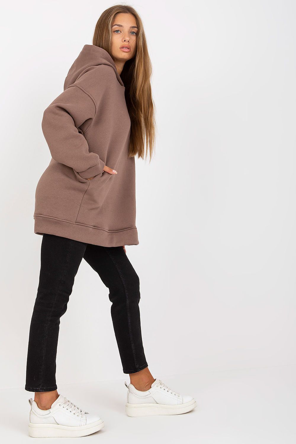 Side view of the Luxury BFG Extended Cut Sweatshirt with Hood and Slip Pockets, highlighting its relaxed fit and high-quality fabric blend of 90% cotton and 10% spandex.