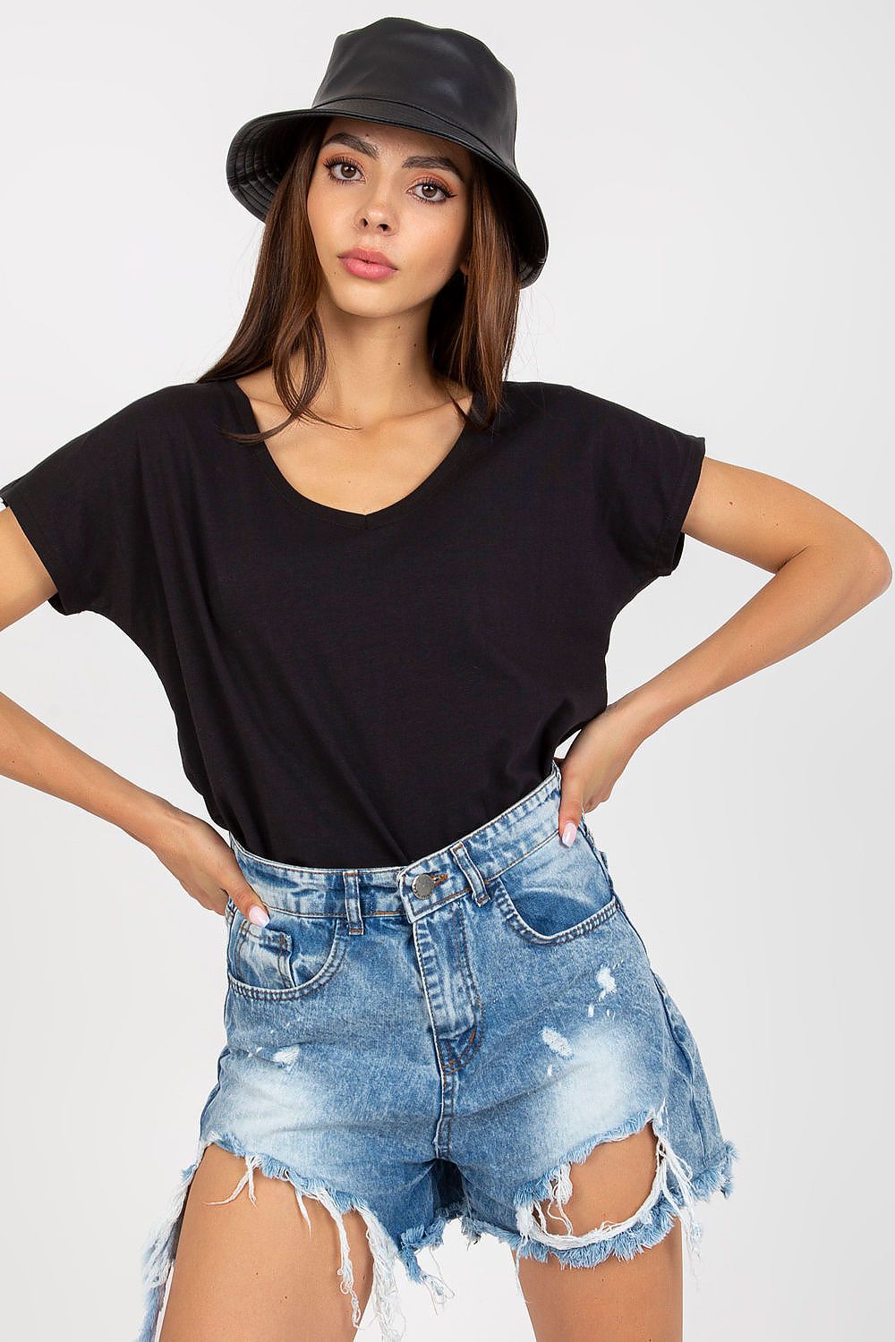 Luxurious Heart Neckline T-Shirt in 95% Cotton worn by a model paired with distressed denim shorts, reflecting sophisticated casual style.