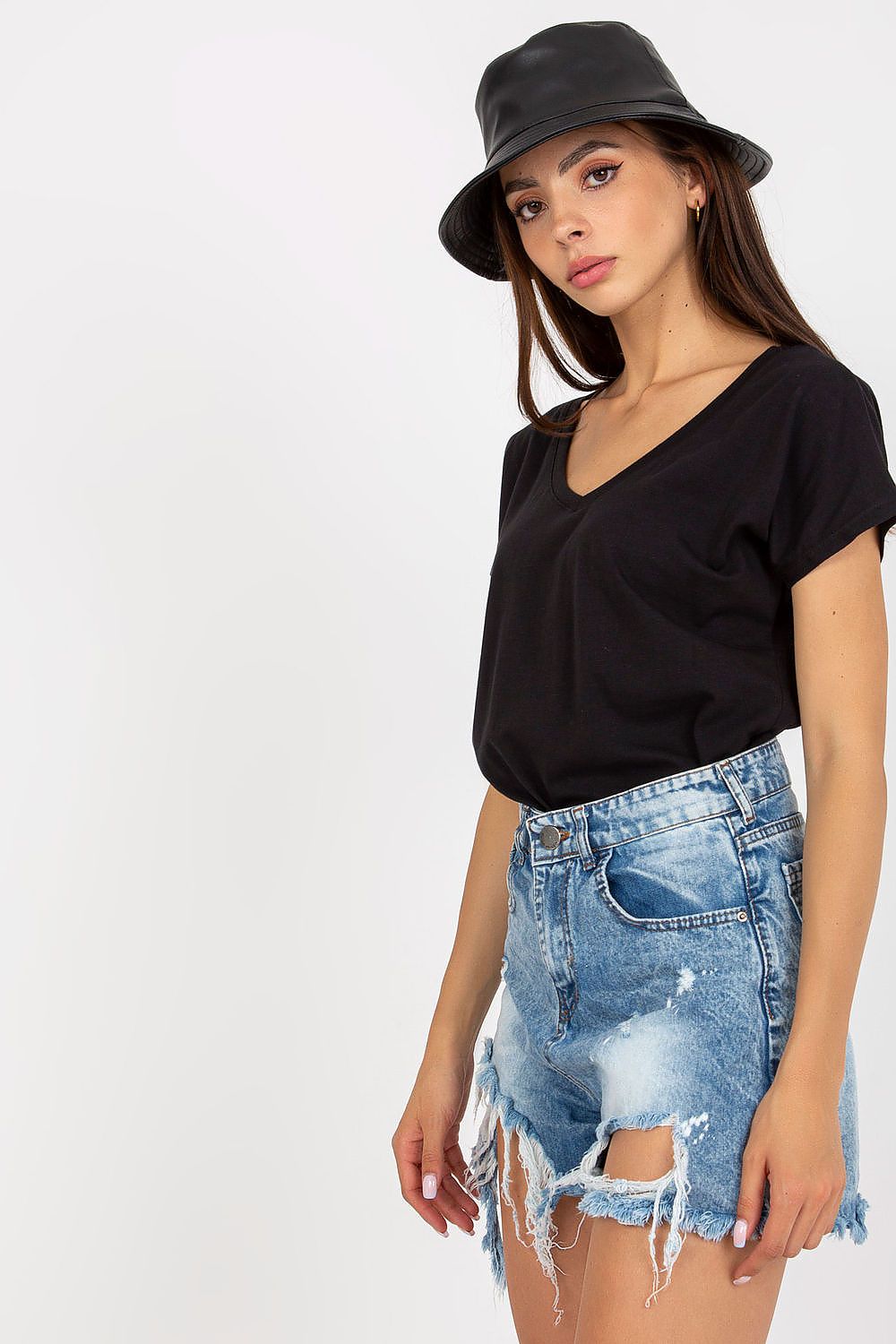 Luxurious Heart Neckline T-Shirt in 95% Cotton styled with a fashionable bucket hat and denim shorts, epitomising luxury and comfort in everyday wear.