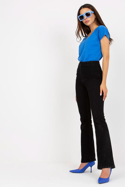 Luxurious Heart Neckline T-Shirt in 95% Cotton showcased on a stylish model wearing high-waisted black jeans and blue heels, complete with fashion-forward oversized blue sunglasses.