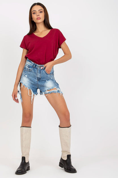 Luxurious Heart Neckline T-Shirt in 95% Cotton showcased with distressed denim shorts and stylish knee-high boots, perfect for chic everyday wear.
