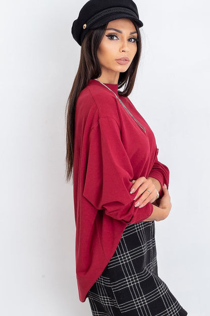 Luxury Women's Cotton Sweatshirt with Stand-Up Collar, showcasing a model in a red sweatshirt paired with a stylish black hat and checkered skirt, emphasizing breathable comfort and chic style.