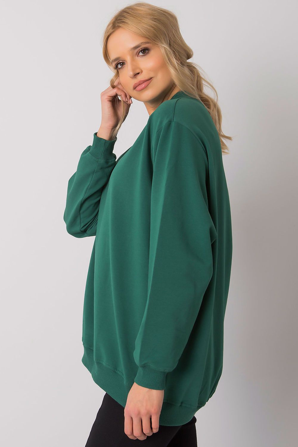 Luxury Women's Cotton Sweatshirt with Stand-Up Collar - Breathable Comfort & Style, showcasing a side view of a model wearing a green sweatshirt, highlighting its stylish silhouette and soft fabric.