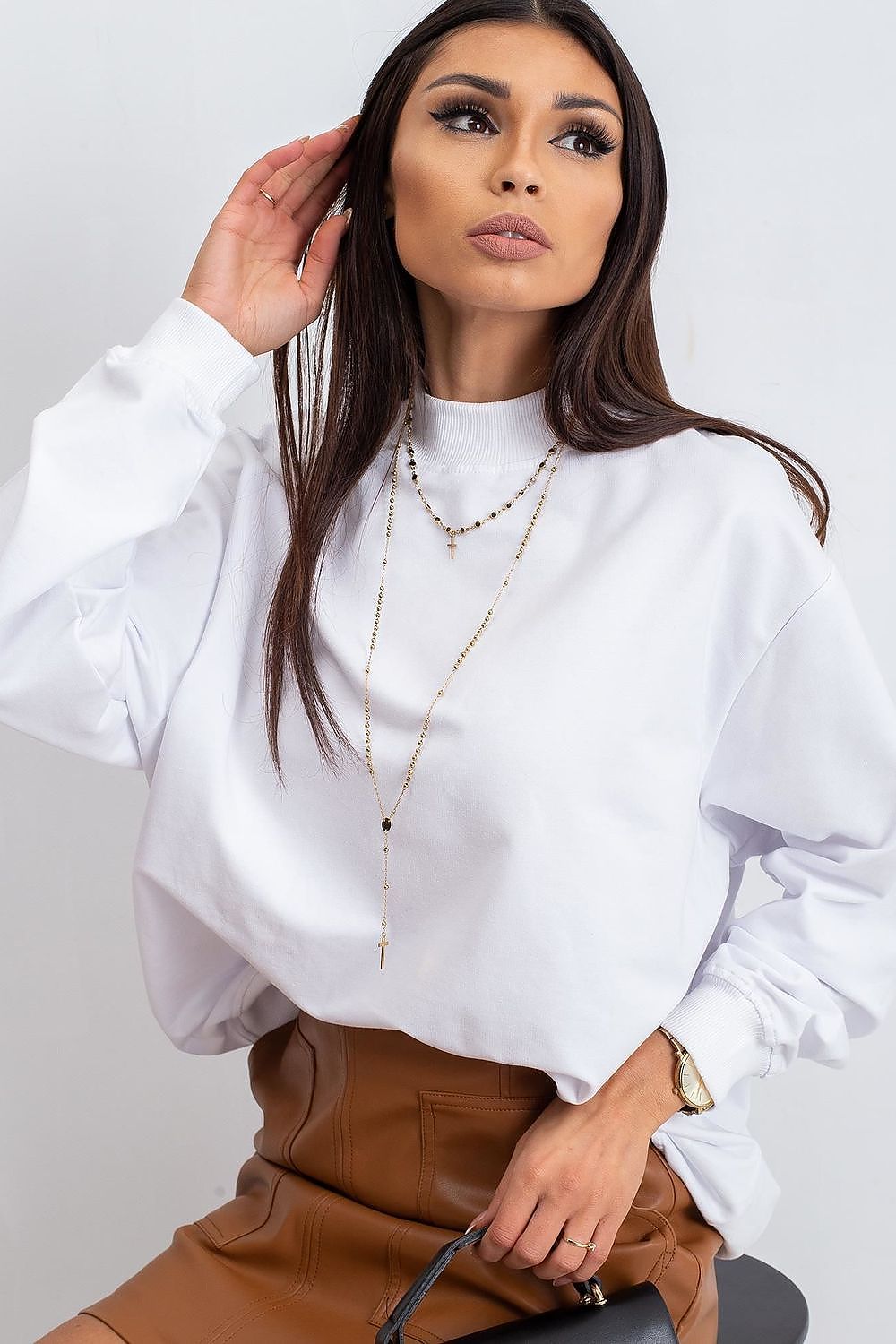 Luxury Women's Cotton Sweatshirt with Stand-Up Collar in classic white, elegantly paired with tailored tan leather skirt and accessories for a refined appearance.