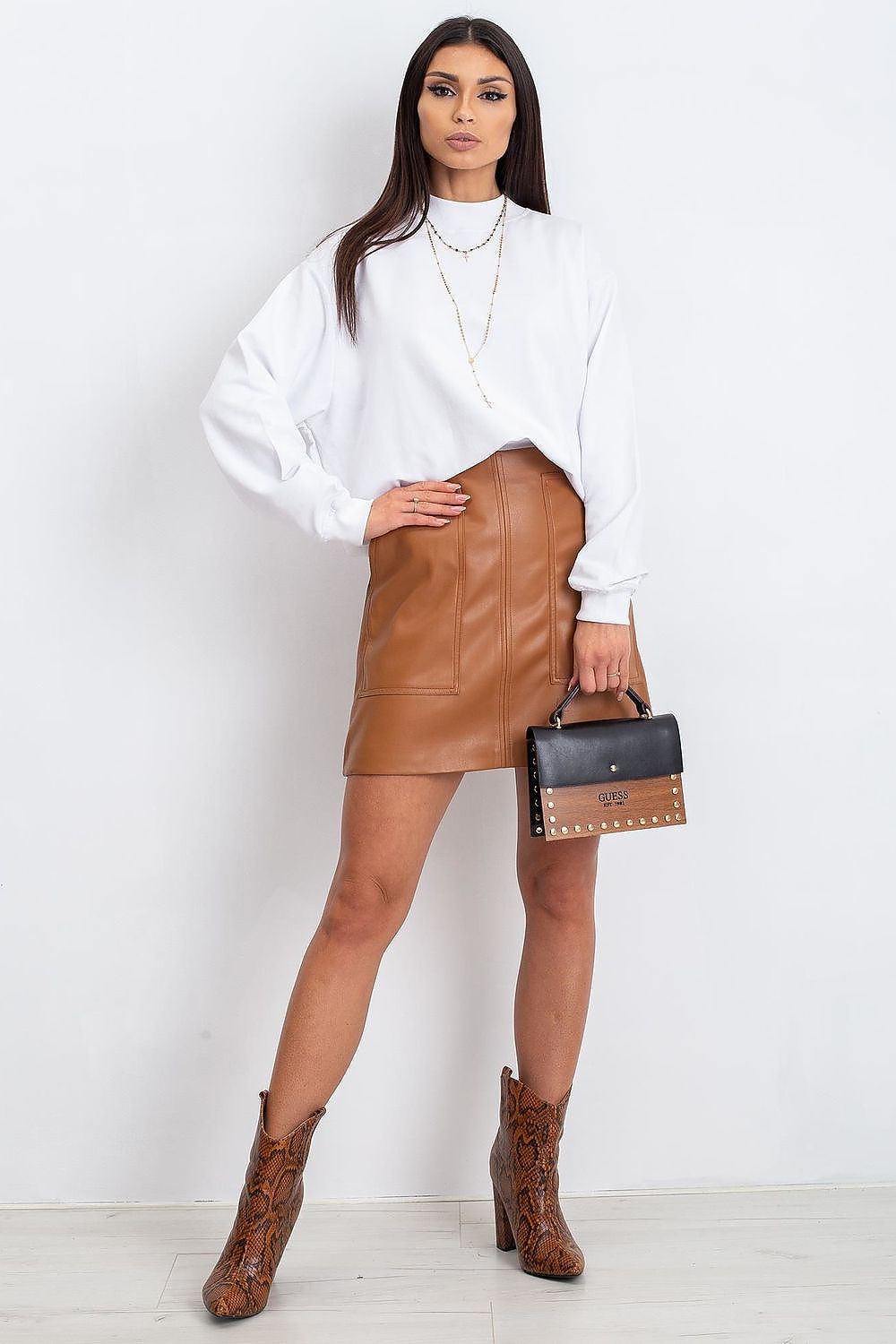 Luxury Women's Cotton Sweatshirt with Stand-Up Collar - Breathable Comfort & Style, model showcasing the sweatshirt paired with a brown leather skirt and stylish accessories.