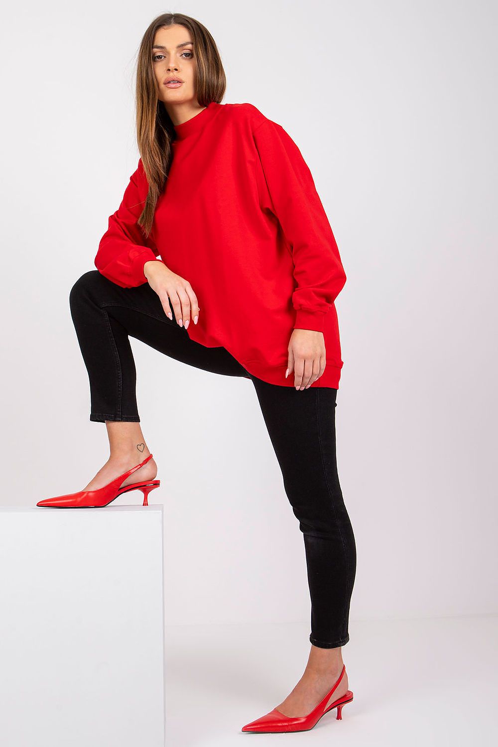 Luxury Women's Cotton Sweatshirt with Stand-Up Collar - Breathable Comfort & Style. Model showcasing the red sweatshirt paired with black fitted trousers and red heels, exuding casual elegance.