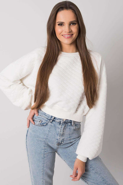 Elegant BFG Quilted Fabric Sweatshirt with Ribbed Hem – Long Sleeves, Perfect for Casual Chic, a vibrant white sweatshirt complemented by high-waisted jeans, enhancing its luxe appeal.