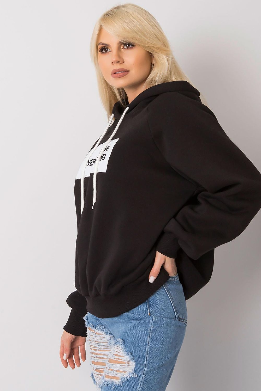 Ex Moda Women's Hooded Sweatshirt - Elegant black hooded sweatshirt showcasing 'Love Everything' print, enhancing a stylish ensemble.