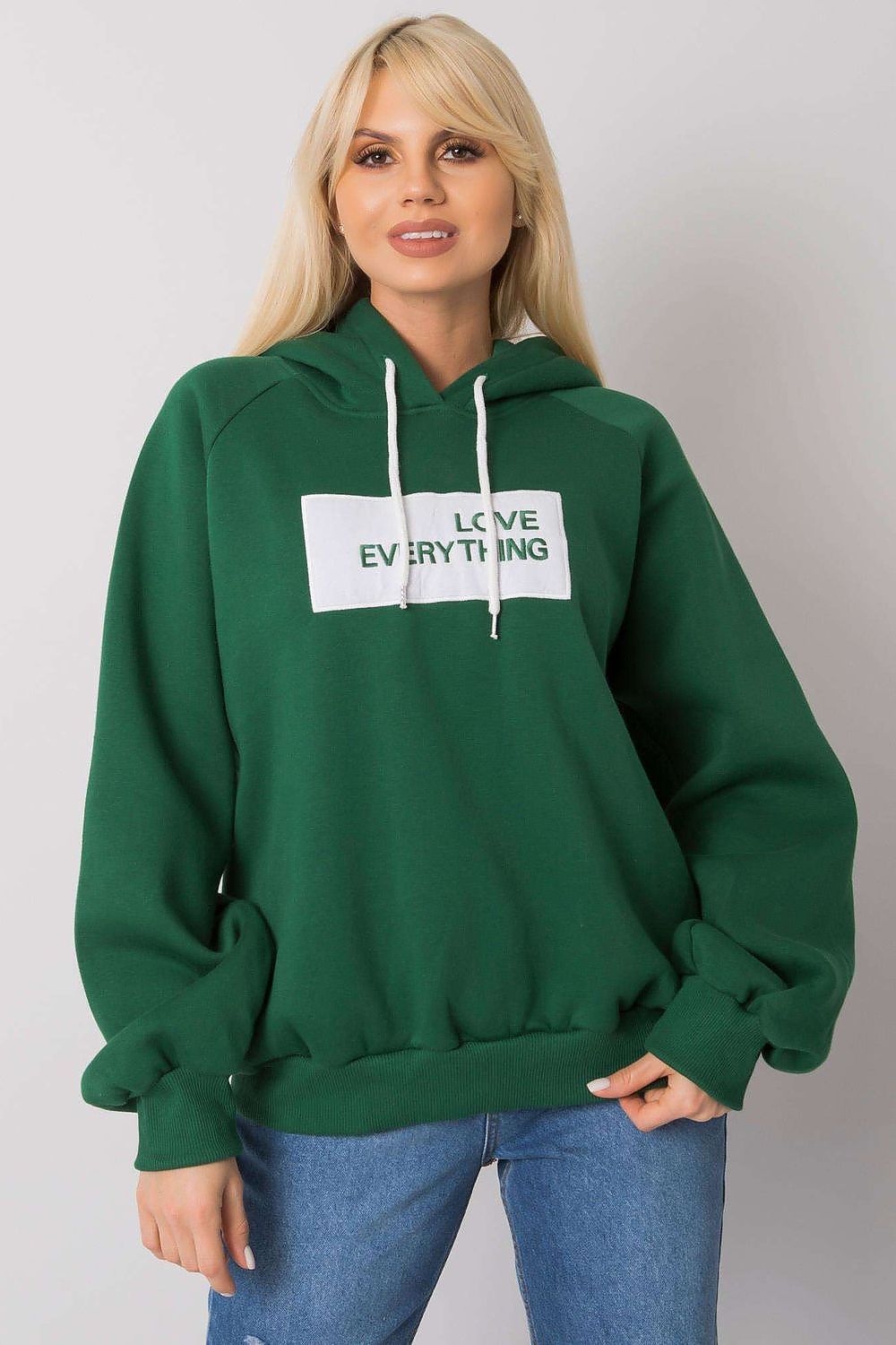 Ex Moda Women's Hooded Sweatshirt in vibrant green, highlighting the front view with an engaging decorative inscription, exuding style and comfort.