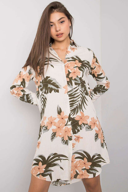 Elegant Rue Paris Long Sleeve Daydress in 100% Viscose - Perfect for Everyday Elegance, showcasing a model wearing a floral-patterned shirt dress with long sleeves and buttons, ideal for sophisticated casual attire.