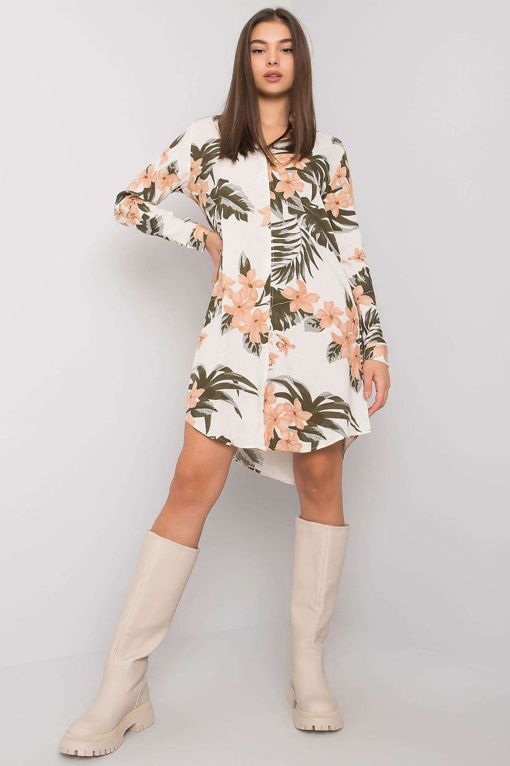 Elegant Rue Paris Long Sleeve Daydress in 100% Viscose, featuring floral patterns with pink and green hues, styled with knee-high beige boots for an effortlessly chic everyday look.