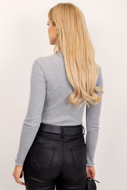 Elegant back view of a model wearing the Rue Paris Women's Long-Sleeve Basic Blouse with Wavy Edges and Comfortable Fit, styled with black trousers, showcasing the chic wavy edges and soft fabric in a sophisticated grey tone.