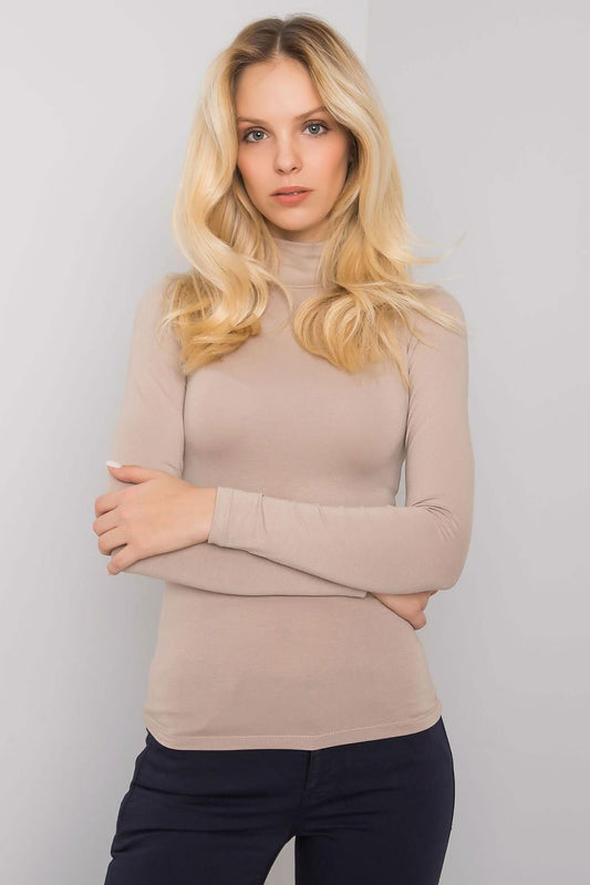 Elegant model showcasing the Luxury Long-Sleeve Turtleneck by Rue Paris, designed in a soft beige hue, crafted from 90% viscose for ultimate comfort and style.
