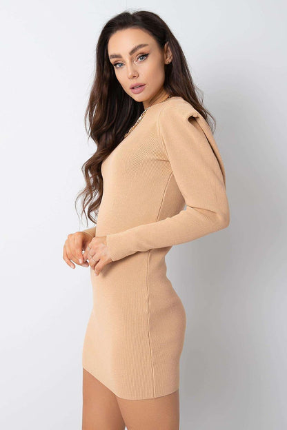 Elegant Rue Paris Long Sleeve Daydress with Round Neckline - 100% Acrylic, presented in a chic beige shade, accentuating its luxurious design and flattering fit from a side view.