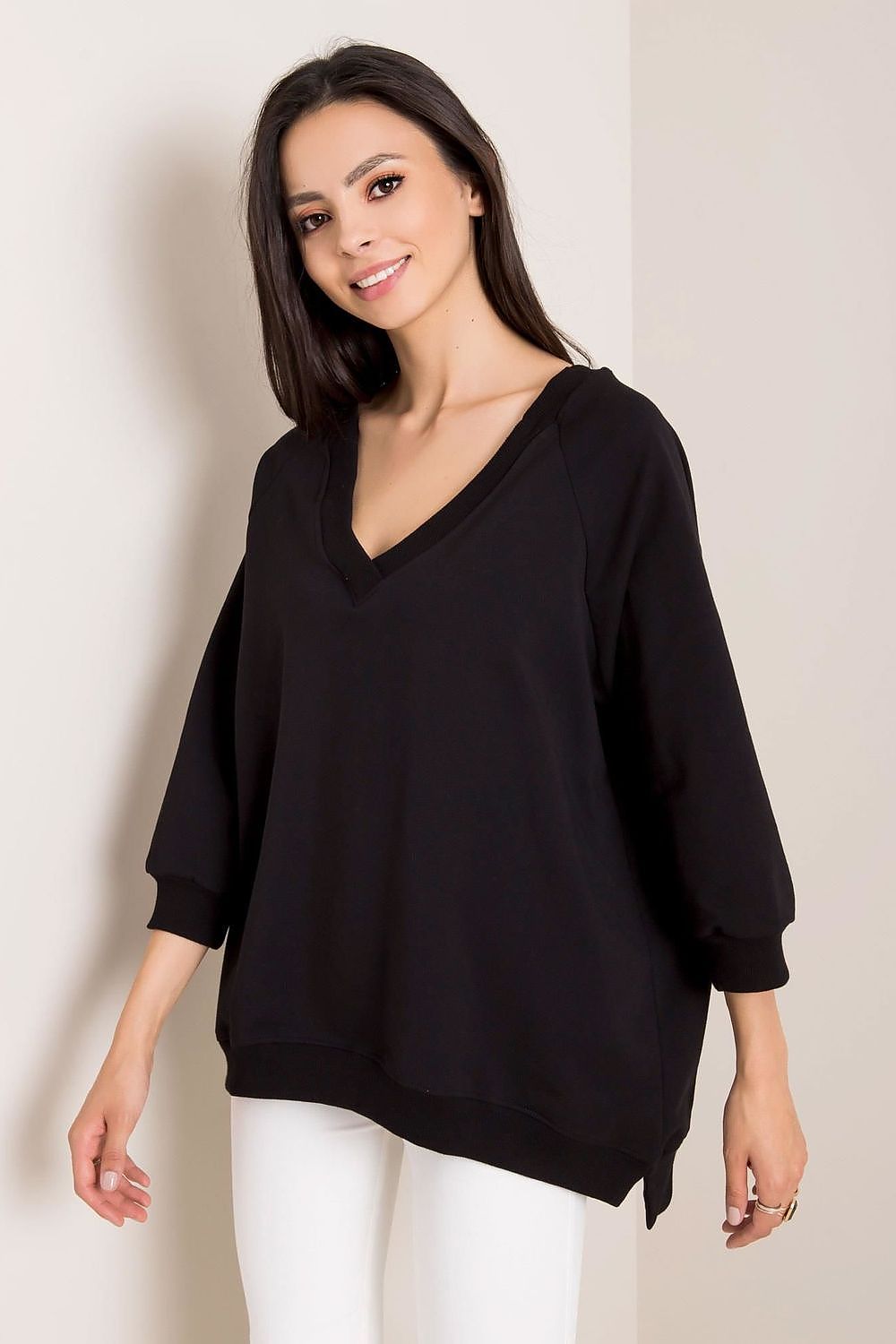 Loose Fit Rue Paris Sweatshirt With Heart Neckline in a classic black, displaying a stylish v-neck and relaxed silhouette for a contemporary fashion statement.