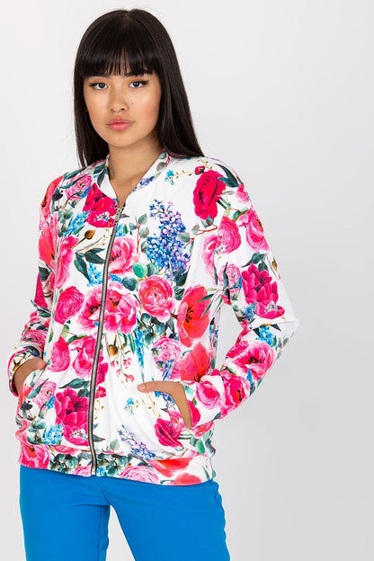 Luxurious Women's Zip-Up Sweatshirt by Rue Paris with Side Pockets, featuring bright floral patterns and model displaying it confidently.