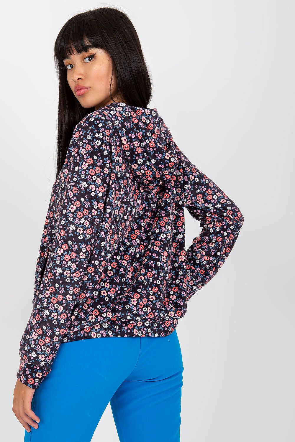 Back view of the Luxury Women's Long-Sleeved Zip-Up Sweatshirt by Rue Paris, highlighting its elegant floral pattern and functional design tailored for modern luxury.
