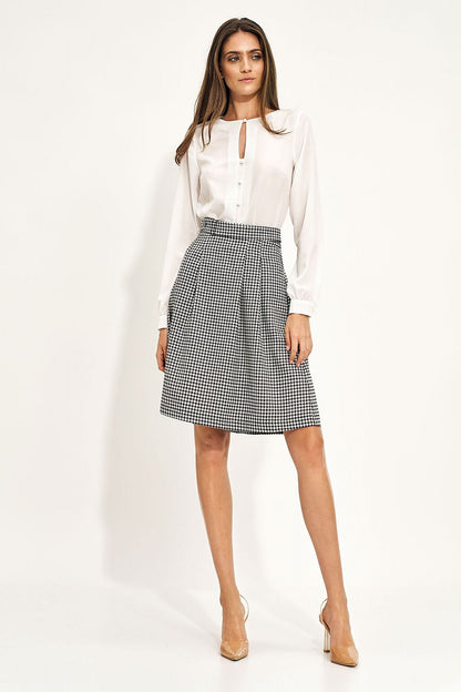 Nife High-Waisted Flared Skirt with Belt, displayed alongside a sophisticated white blouse, ideal for chic casual outfits.