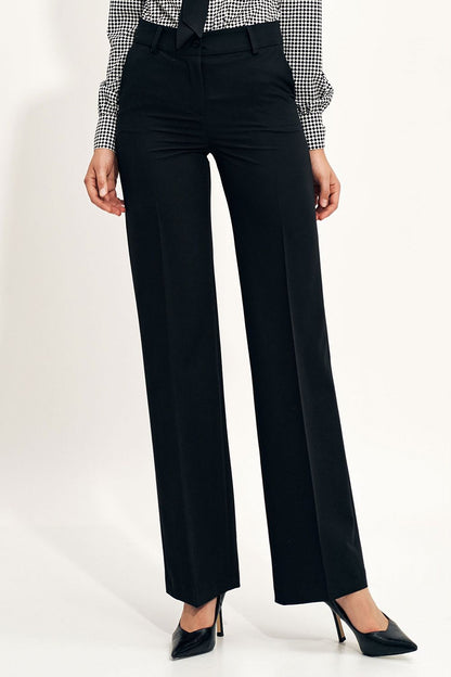 Elegant Wide Leg Trousers by Nife showcased on a model, featuring a flattering silhouette made from a comfortable spandex blend, styled for a luxury look.