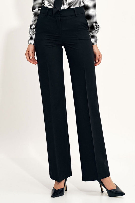 Elegant Wide Leg Trousers by Nife showcased on a model, featuring a flattering silhouette made from a comfortable spandex blend, styled for a luxury look.