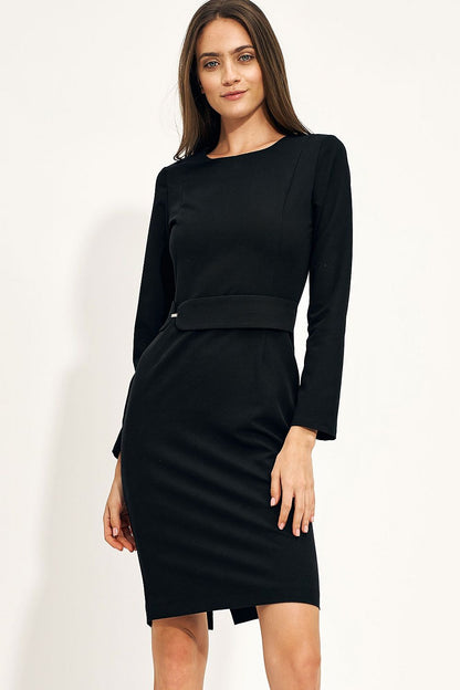 Elegant black pencil dress with long sleeves and waist embellishment by Nife, showcasing a stylish front view on a model.