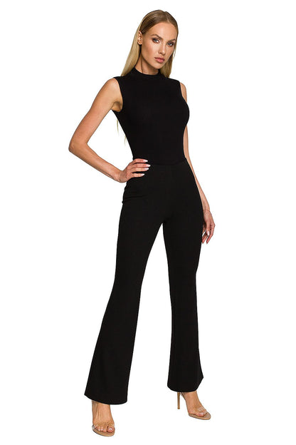 Elegant Women’s Stretchy Bell Trousers with Elastic Waistband by Moe - Chic & Comfortable, showcasing a front view of a model wearing a fitted black top and bell trousers, exuding sophistication and style.