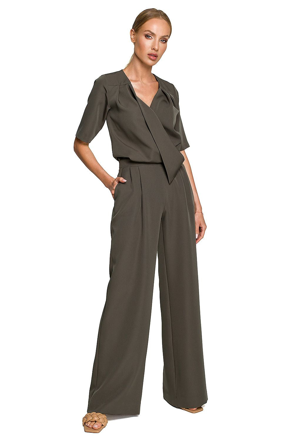 Stylish model wearing the Elegant Wide Leg Trouser Suit with Elbow-Length Sleeves and Pockets by Moe in chic olive green, ideal for elegant events.