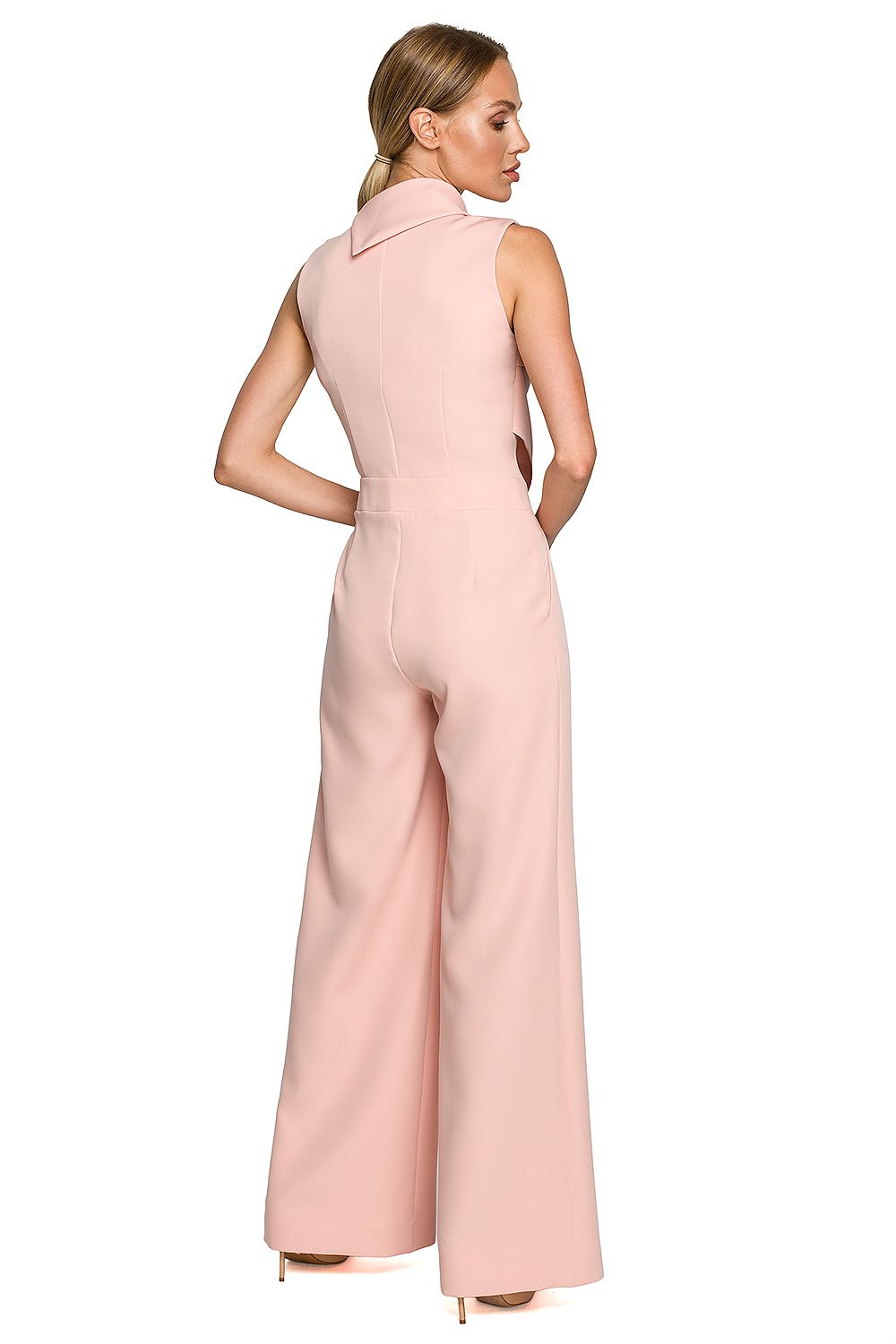 Back view of the Elegant Wide-Leg Jumpsuit with Roll-Up Collar and Decorative Closure in pink by Moe, revealing its stylish back design.
