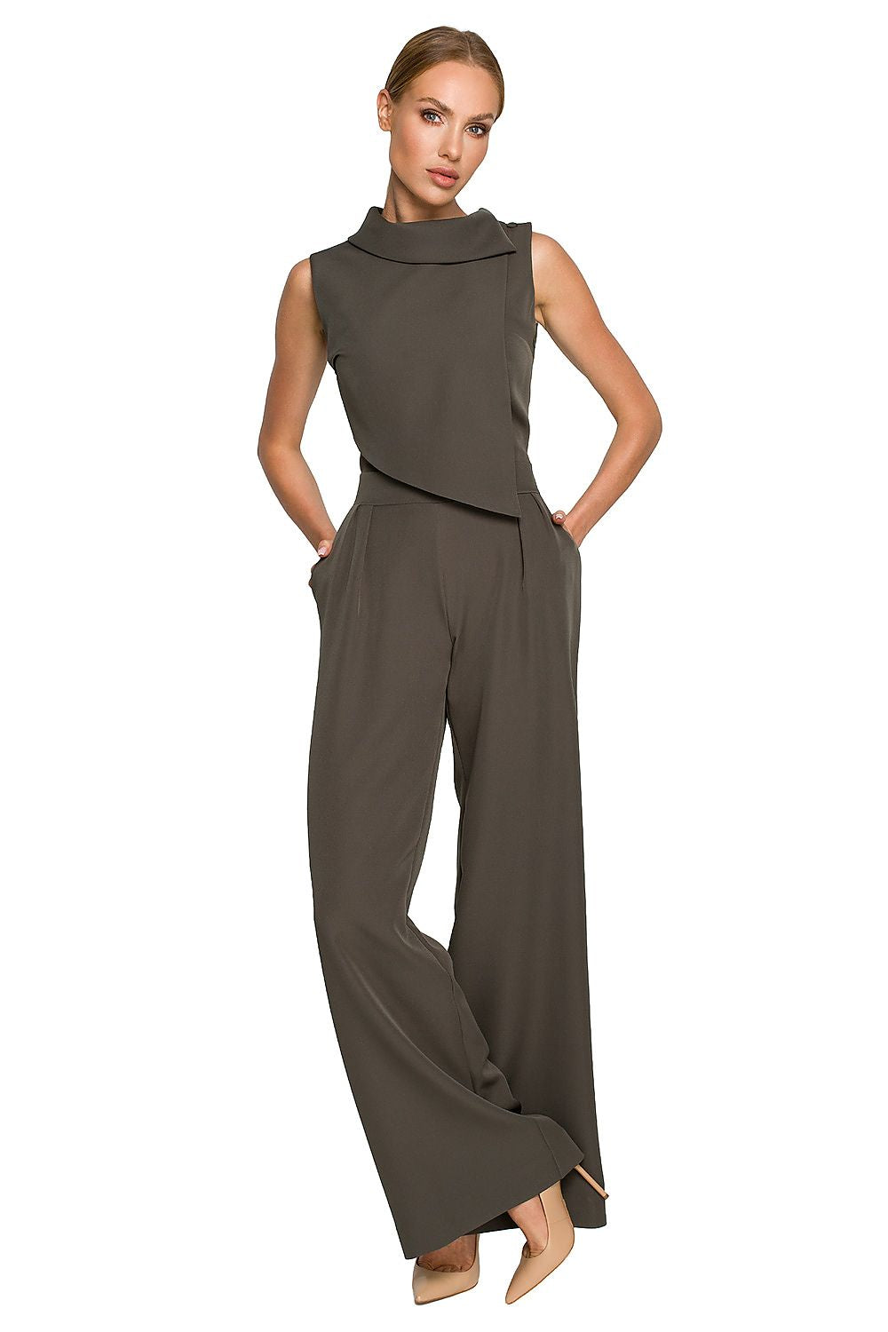 Chic dark green Elegant Wide-Leg Jumpsuit with Roll-Up Collar and Decorative Closure by Moe, model posing gracefully.