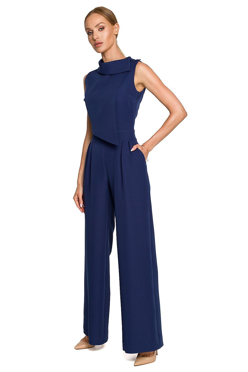 Striking navy blue Elegant Wide-Leg Jumpsuit with Roll-Up Collar and Decorative Closure by Moe, model presenting a refined look.