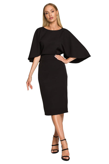 Elegant Knee-Length Cocktail Dress With Ruffled Sleeves by Moe in sophisticated black, showcasing a fitted silhouette and ruffled sleeves, ideal for luxurious special occasions.