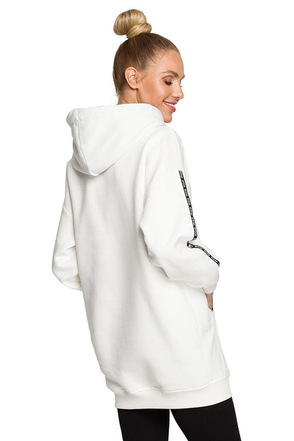 Moe Luxury Fleece-Lined Sweatshirt Tunic in white, showcasing a stylish design with a hood and logo detailing, perfect for a chic and comfortable look.