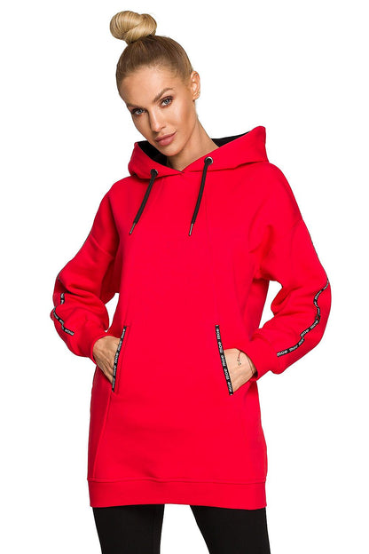 Moe Luxury Fleece-Lined Sweatshirt Tunic in striking red, featuring a unique design with a hood and logo accents, ideal for a fashionable and cosy style.