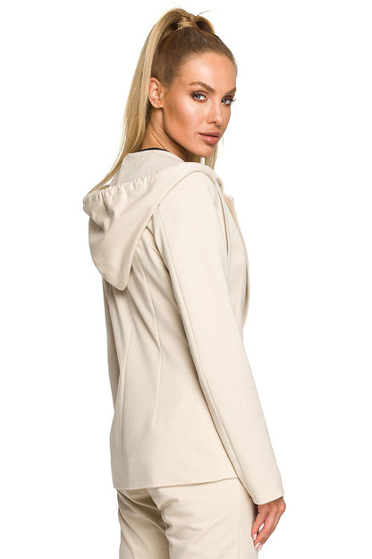 Stylish Moe Luxe Knitted Fabric Jacket with Hood and Pockets in beige, highlighting its subtle elegance and modern design.