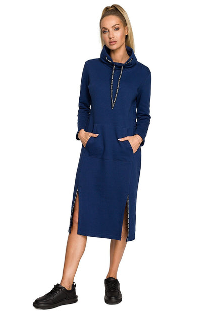 Moe Daydress: Elegant Midi Dress in a striking blue colour, presented on a model with a high collar and playful slits, exemplifying modern luxury.