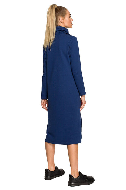 Moe Daydress: Elegant Midi Dress shown from the back on a model, featuring sleek lines and a comfortable design in a rich blue shade.