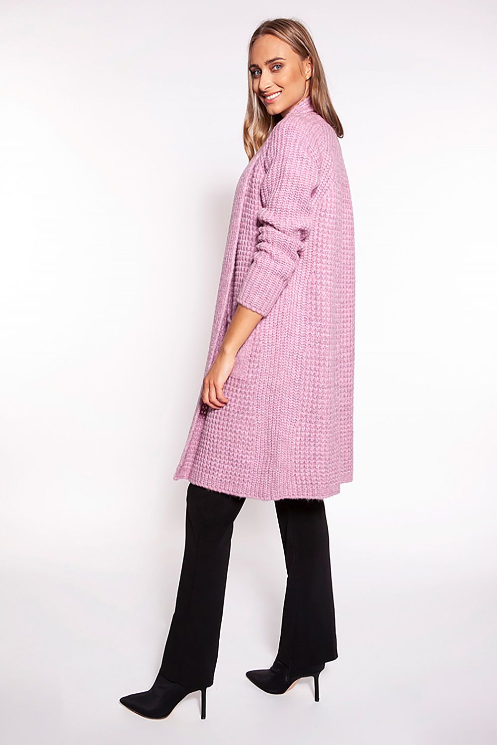 Elegant MKM Waffle Textured Cardigan With Shawl Collar And Practical Pockets - Knee-Length Design, showcased from a side angle on a model, revealing its chic shape and luxurious texture.