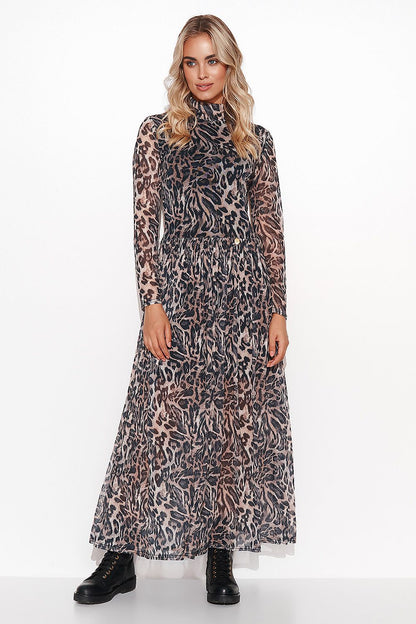 The Makadamia maxi dress in stylish display, perfect for formal occasions with its sophisticated long sleeve design.