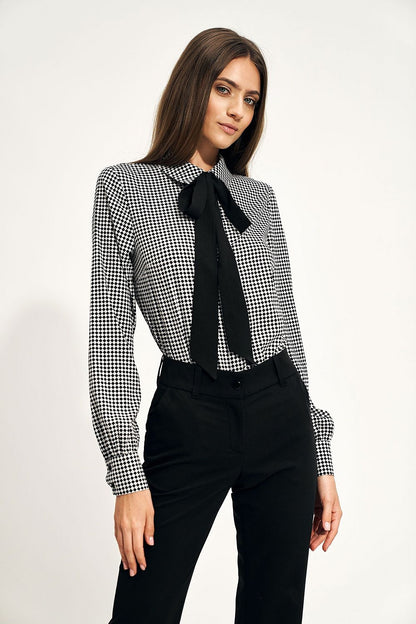 Elegant Long Sleeve Bow Shirt by Nife showcased on a model, featuring a stylish black and white checkered print, perfect for sophisticated office wear.