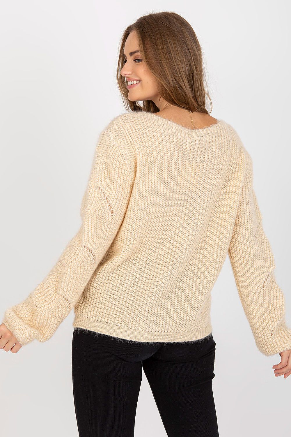 Back view of the Och Bella Openwork Sweater with Long Sleeves and Boat Neckline, highlighting its luxurious knit texture and stylish silhouette.