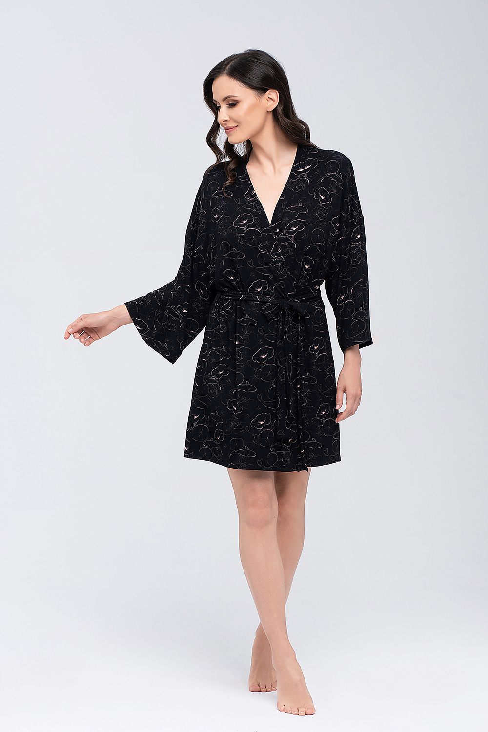 Luxurious Silky Viscose Bathrobe with Adjustable Belt by Babella, showcasing a model in a stylish black robe with floral patterns, perfect for relaxation and elegance.