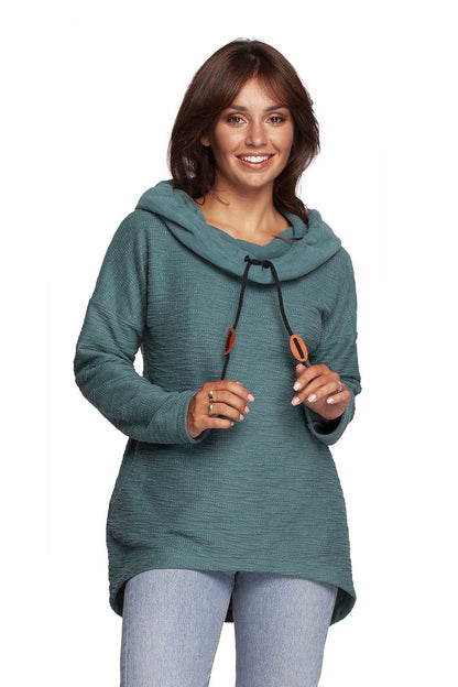 BeWear Oversized Cotton Blend Hooded Sweatshirt Tunic for Comfortable Cold Weather, featuring a stylish model smiling, showcasing the hood and collar in a rich teal colour.