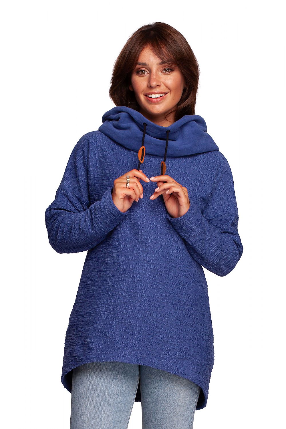 Chic model wearing the BeWear Oversized Cotton Blend Hooded Sweatshirt Tunic in deep blue, offering a stylish and cosy look for chilly days.