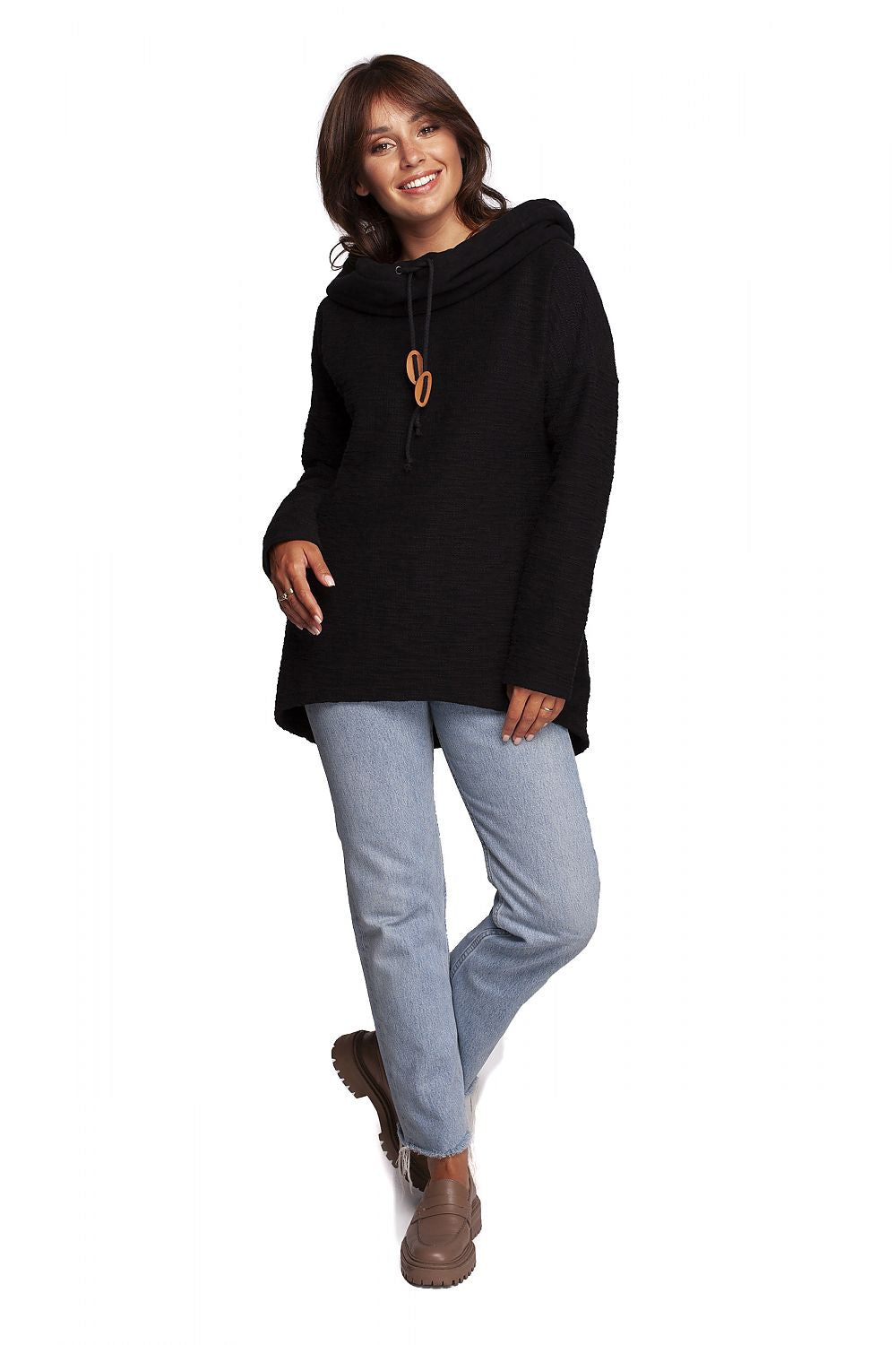 BeWear Oversized Cotton Blend Hooded Sweatshirt Tunic in black, featuring a cozy hood and chic oversized cut, styled with denim for an elegant cold-weather look.