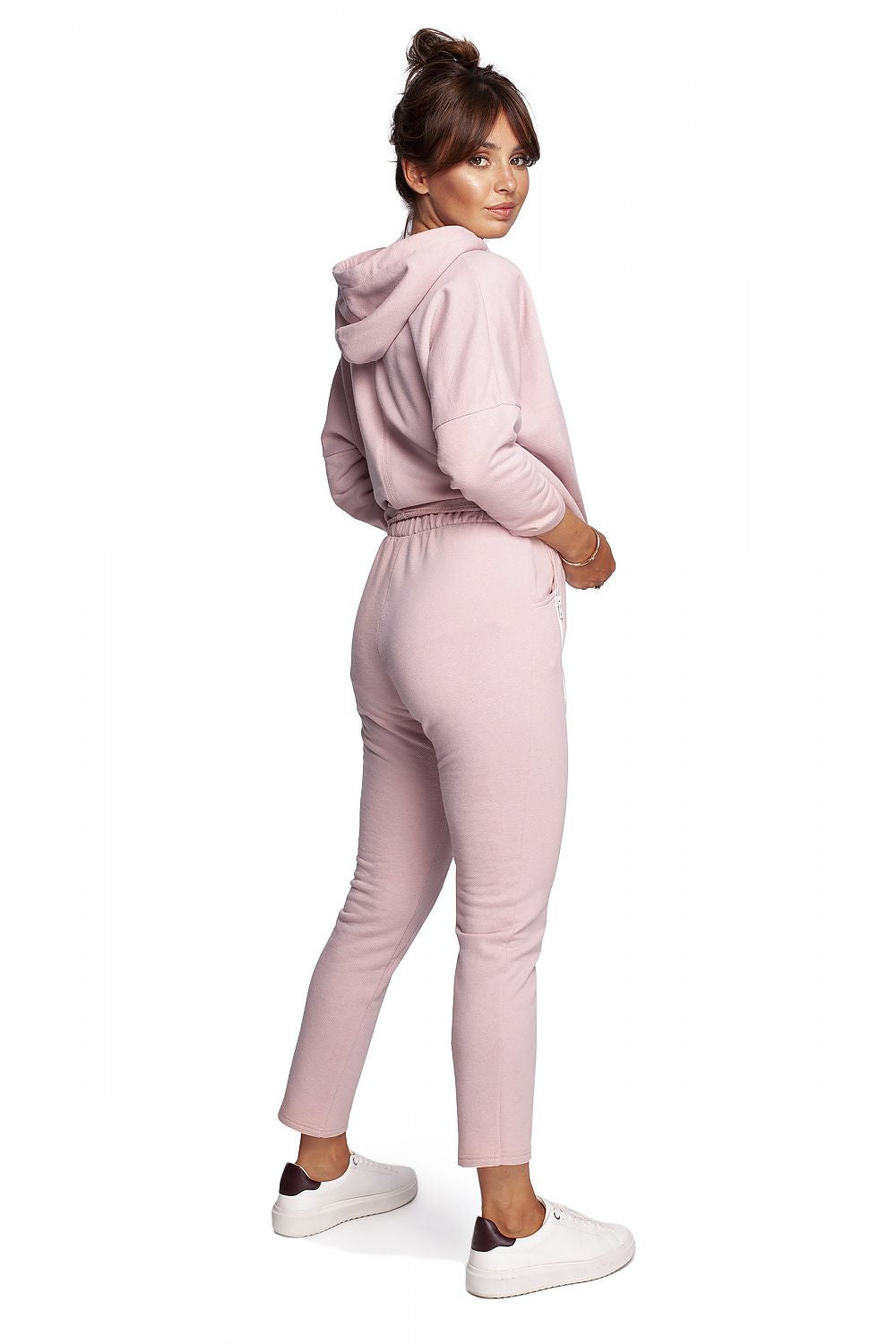 Luxury BeWear Tracksuit Trousers with Decorative Zips and Asymmetrical Stitching - Comfortable Knitted Fabric, showcased on a model wearing a light pink tracksuit from the back.